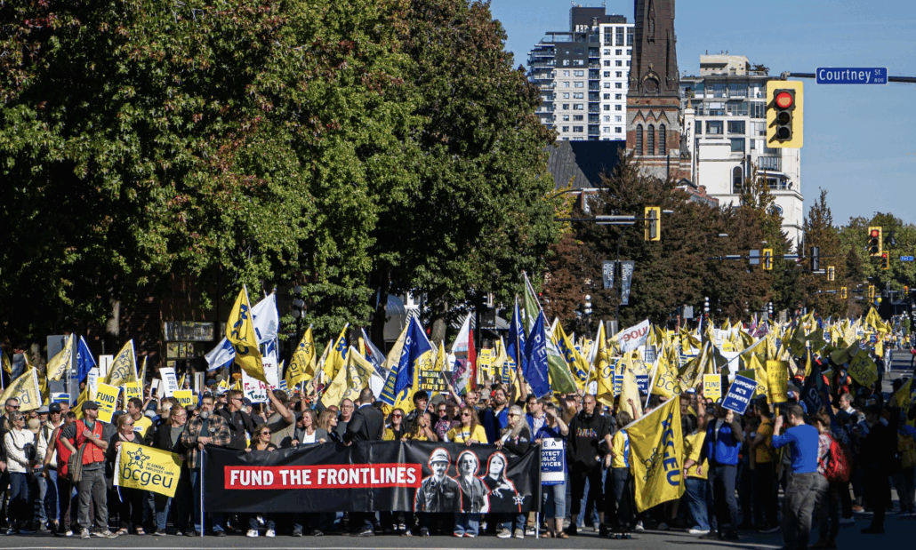 fund the frontlines sign